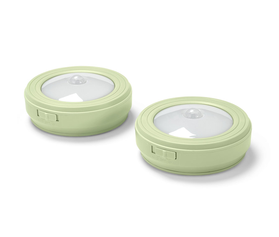 Dve multifunkčné svietidlá s LED svetlozelenej farby.