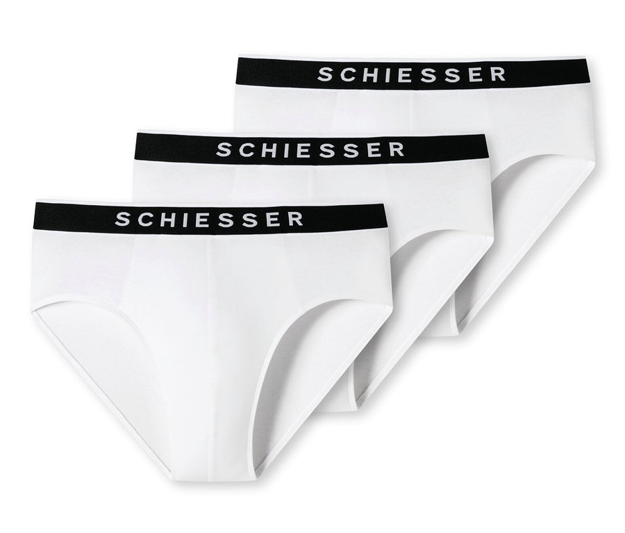 Troje bielych nohavičiek SCHIESSER Rio-Slip s biobavlnou s čiernym pásom ležia na sebe.