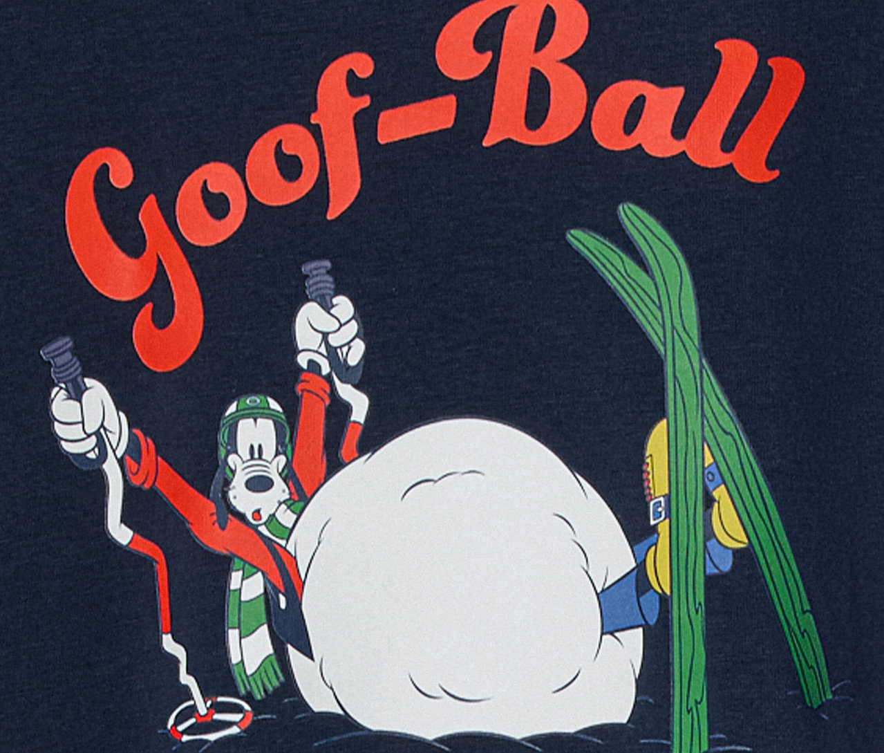 Kreslená postavička Goofy s lyžiarskym výstrojom v zasneženej scéne s nápisom "Goof-Ball".