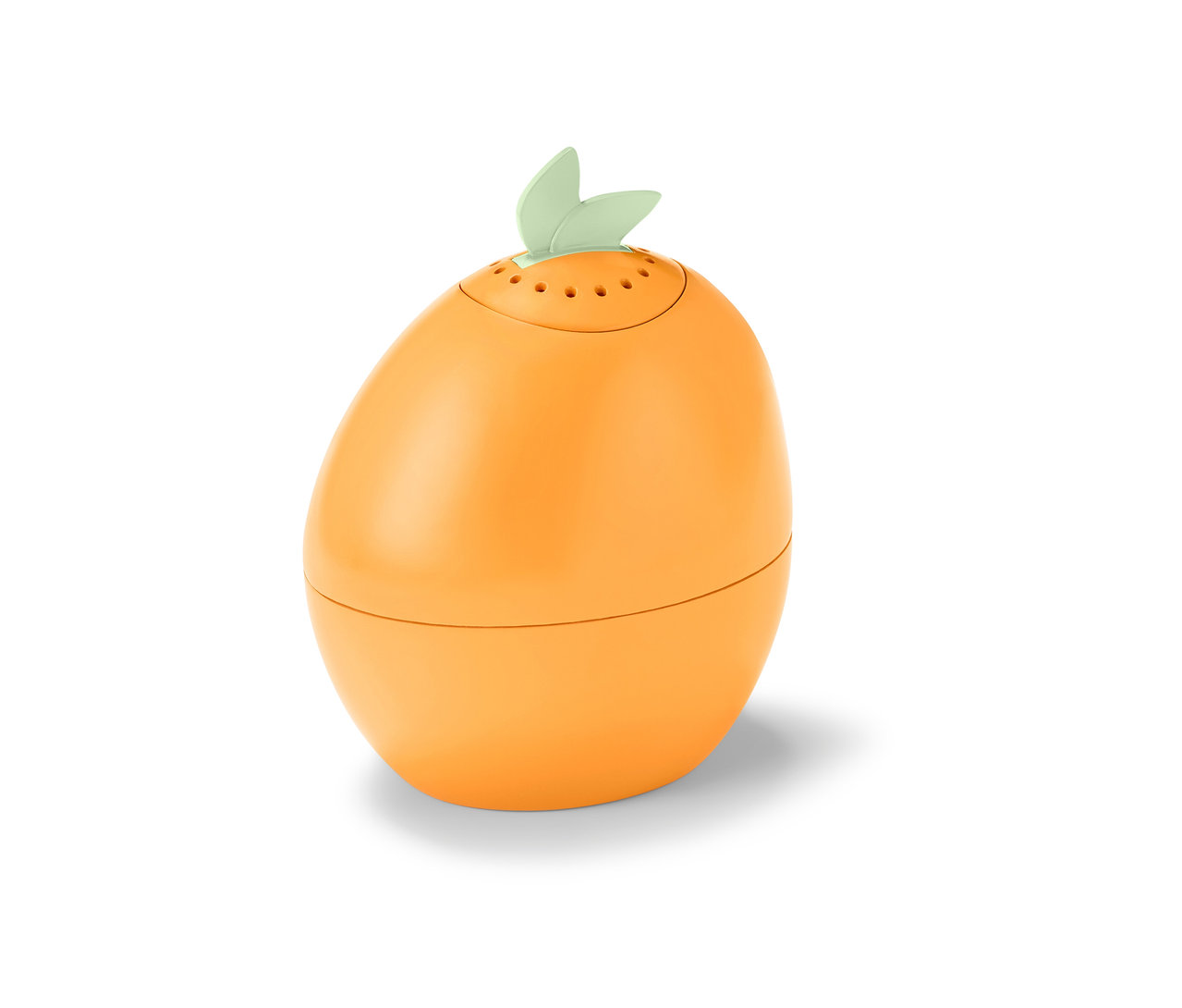 Oranžový čistič mikrovlnnej rúry v tvare vajca s lístkami hore.