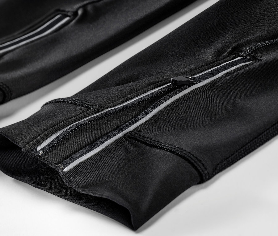 Detail cyklistických nohavíc s vreckom na zips.