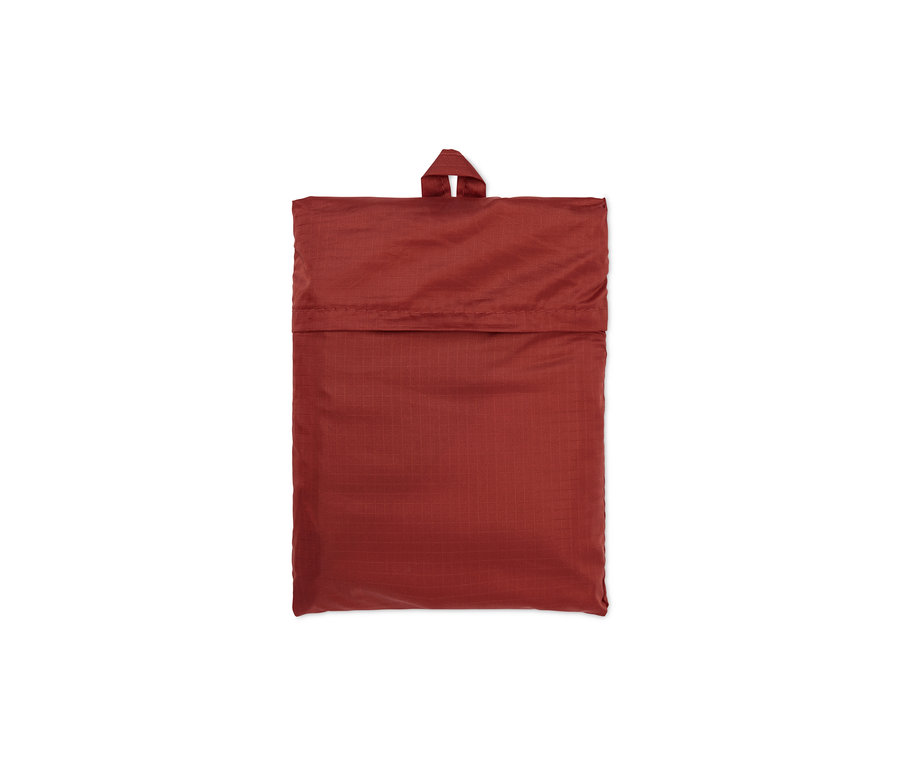 Zložená malá deka na piknik.