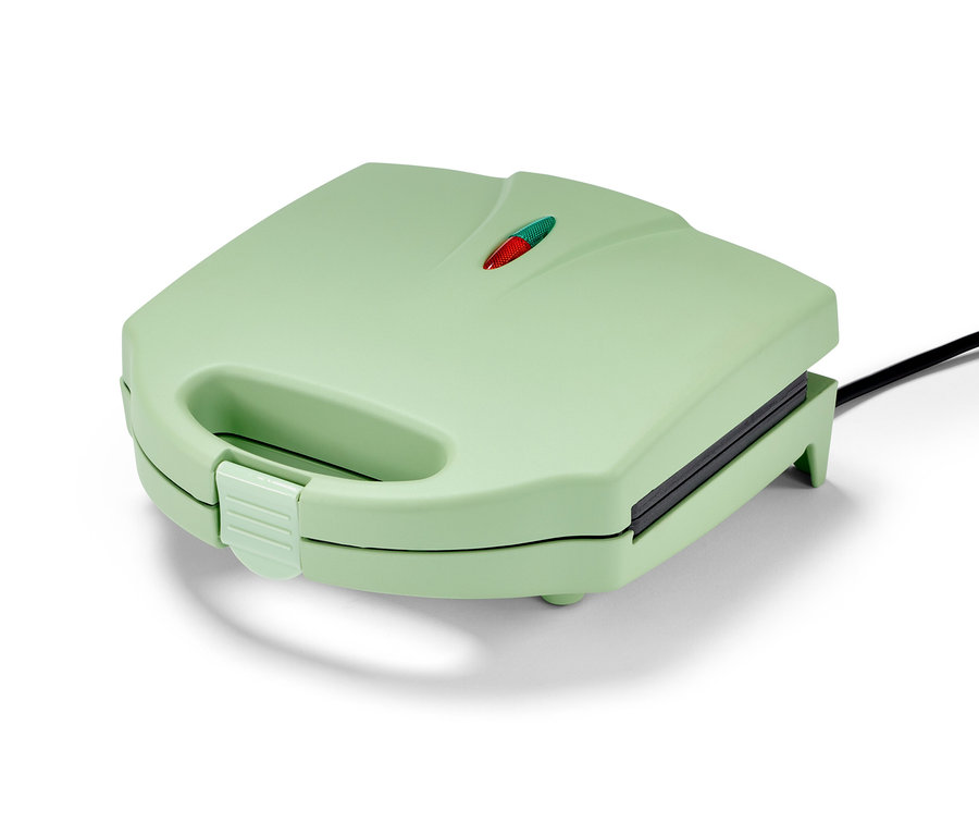 Zatvorený svetlozelený vafľovač s čiernym káblom.