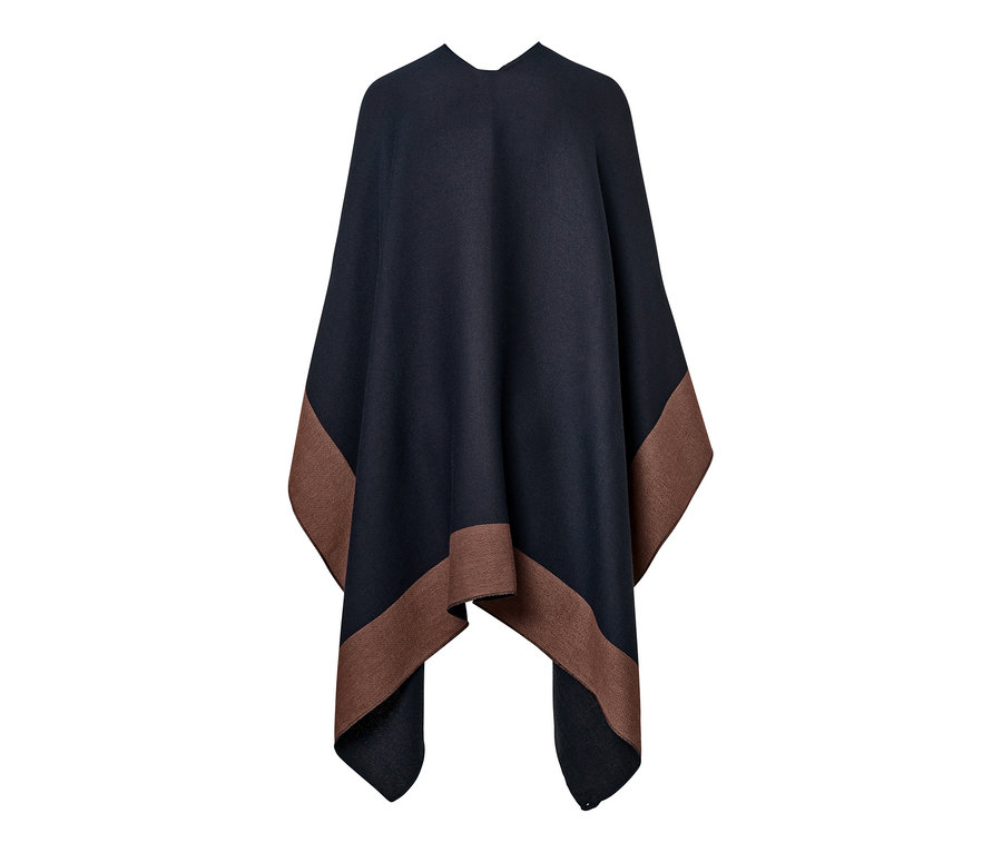 Detail obojstranného ponča s hnedým lemom.