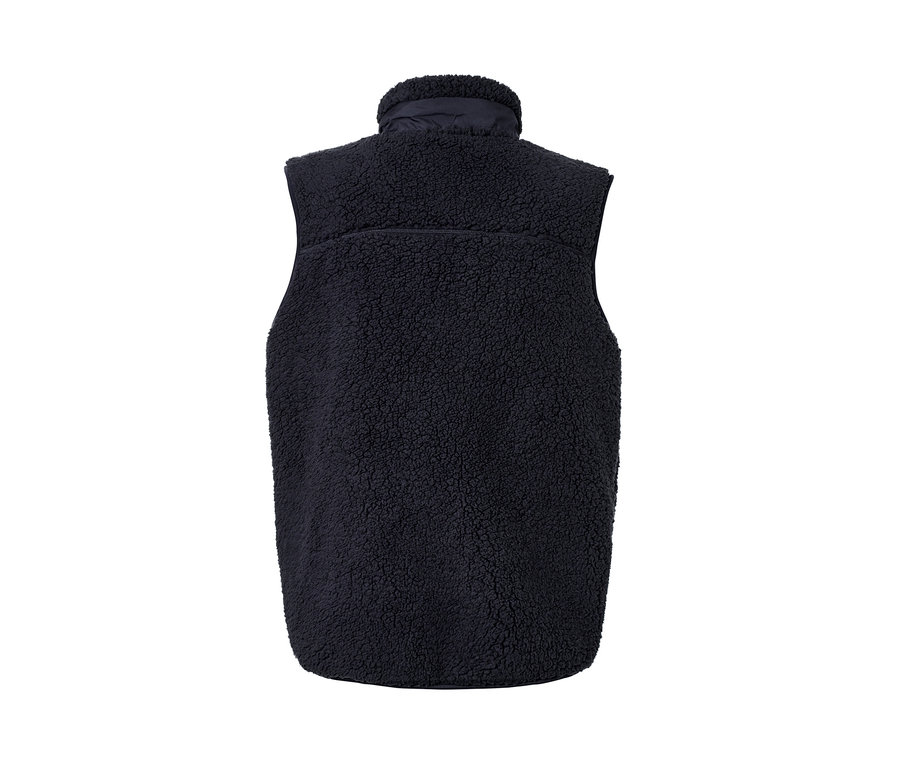 Tmavomodrá plyšová vesta.