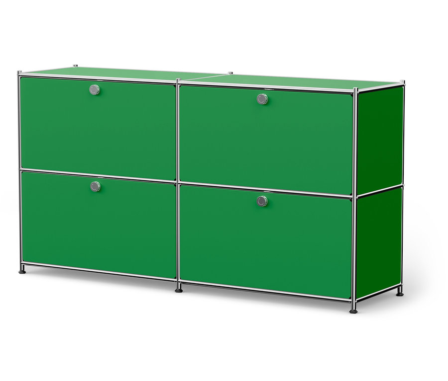 Zelená skrinka so štyrmi zásuvkami a striebornými úchytmi.